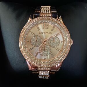 Bebe Rose Dial Crystal Bezel Watch